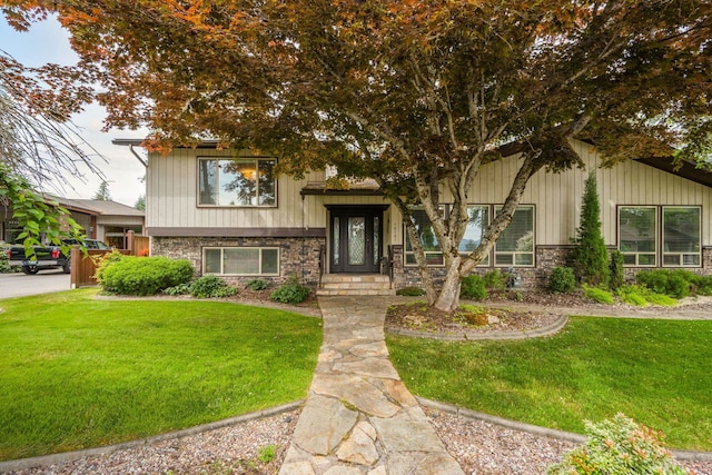 10101 N Pines Rd, Hayden, ID 83835 - view of front of property with a front lawn and stone siding