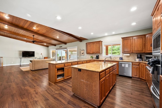 10101 N Pines Rd, Hayden, ID 83835 - kitchen featuring stainless steel appliances, a warming drawer, an island with sink, open floor plan, and ceiling fan