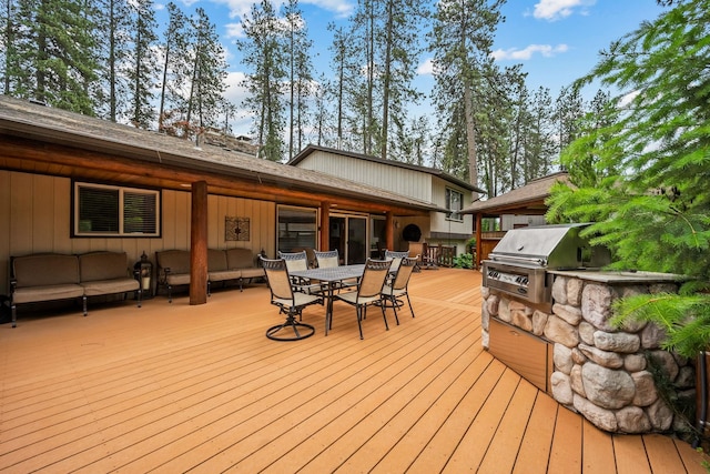 10101 N Pines Rd, Hayden, ID 83835 - deck featuring outdoor dining area and an outdoor living space