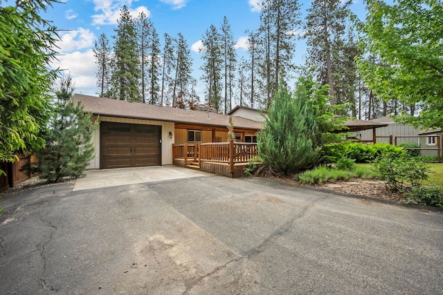 10101 N Pines Rd, Hayden, ID 83835 - view of front of house with a garage and driveway