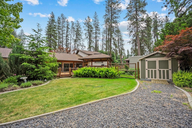 10101 N Pines Rd, Hayden, ID 83835 - view of yard with a wooden deck