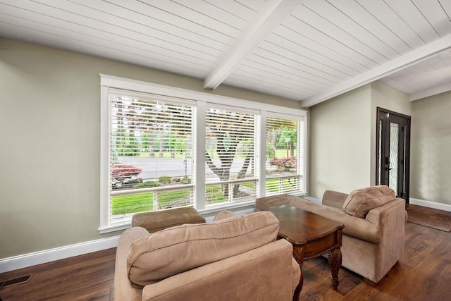10101 N Pines Rd, Hayden, ID 83835 - living area featuring healthy amount of natural light, baseboards, dark wood-style flooring, and wooden ceiling