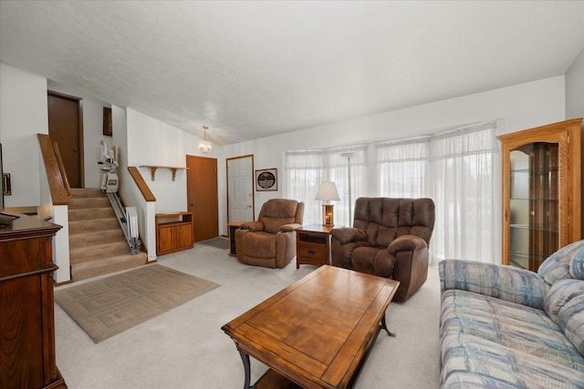 13715 E Rich Ave, Spokane Valley, WA 99216 - carpeted living room with stairs and vaulted ceiling