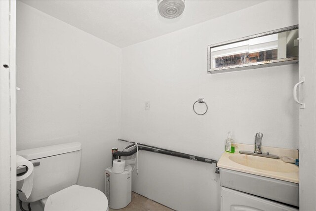 13715 E Rich Ave, Spokane Valley, WA 99216 - half bathroom featuring toilet and vanity