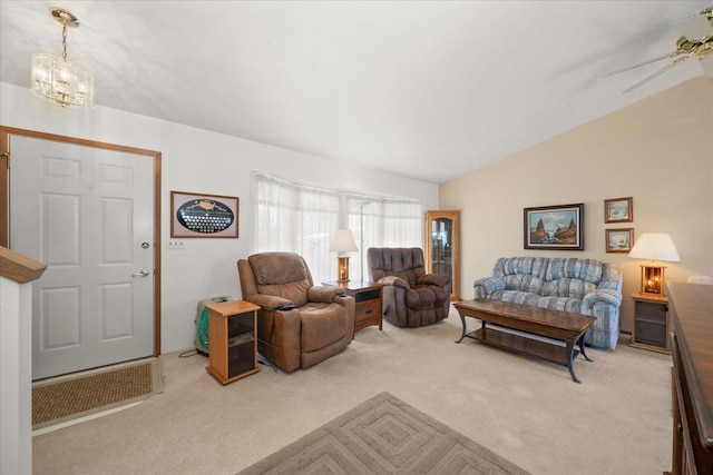 13715 E Rich Ave, Spokane Valley, WA 99216 - living room featuring light carpet, lofted ceiling, ceiling fan, and a chandelier