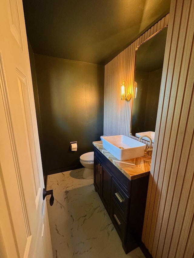 8616 E Desmet Ave, Spokane Valley, WA 99212 - bathroom featuring vanity, marble finish flooring, and toilet