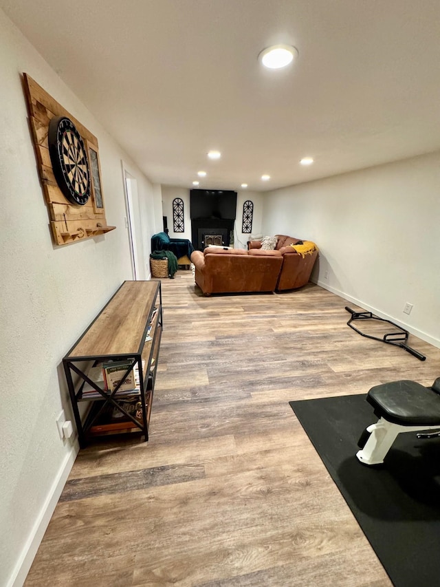 8616 E Desmet Ave, Spokane Valley, WA 99212 - living room featuring wood finished floors, baseboards, a fireplace, and recessed lighting