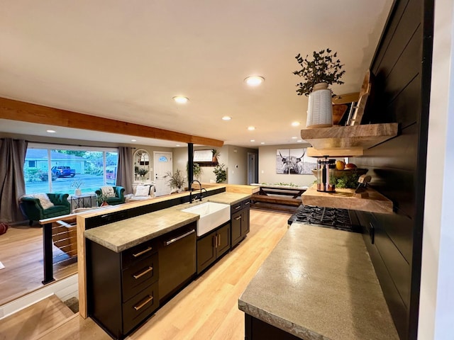 8616 E Desmet Ave, Spokane Valley, WA 99212 - kitchen featuring a sink, open floor plan, recessed lighting, light wood finished floors, and light countertops