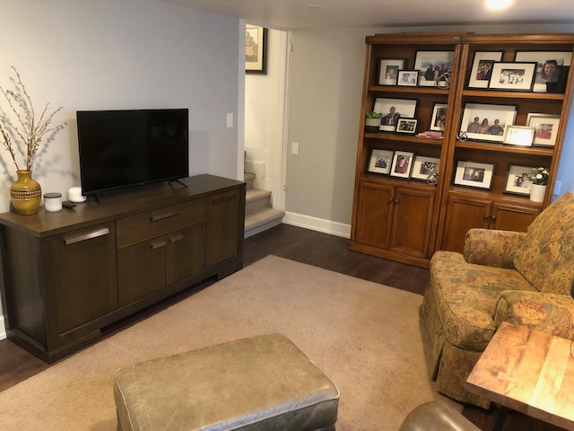 1617 S Bernard St, Spokane, WA 99203 - living room with dark wood finished floors, stairs, and baseboards