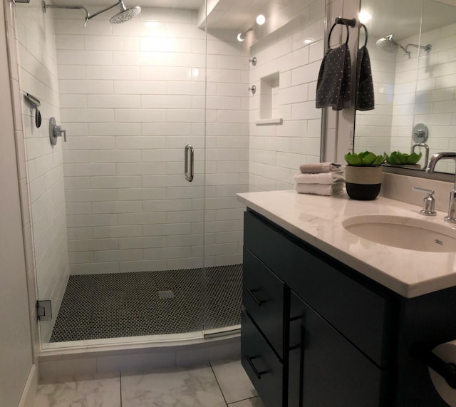 1617 S Bernard St, Spokane, WA 99203 - bathroom featuring marble finish flooring, a stall shower, and vanity