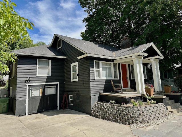 1617 S Bernard St, Spokane, WA 99203 - view of front of property featuring a chimney and a shingled roof