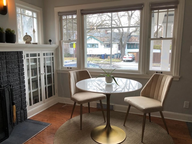 1617 S Bernard St, Spokane, WA 99203 - dining area featuring healthy amount of natural light, wood finished floors, and baseboards