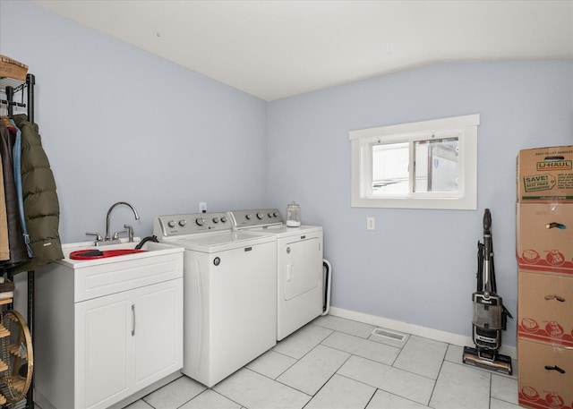 1306 W Euclid Ave, Spokane, WA 99205 - laundry area featuring separate washer and dryer, cabinet space, and baseboards