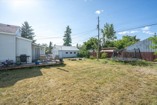 1306 W Euclid Ave, Spokane, WA 99205 - view of yard with a trampoline and an outbuilding