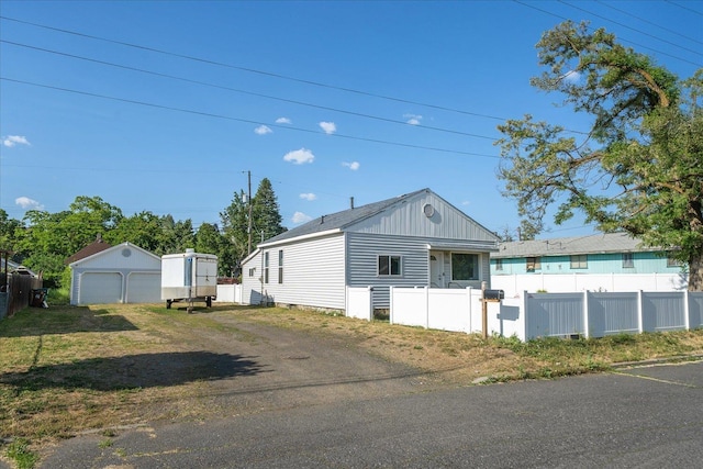 1306 W Euclid Ave, Spokane, WA 99205 - view of front of property with a detached garage and dirt driveway