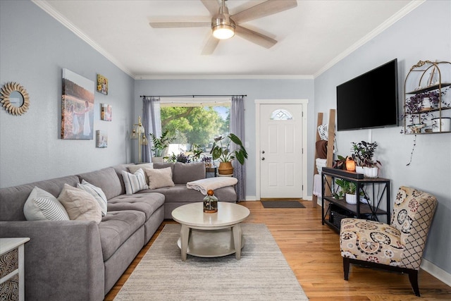 1306 W Euclid Ave, Spokane, WA 99205 - living area with wood finished floors, ornamental molding, and ceiling fan