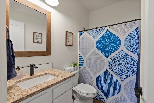 1812 E Columbia Ave, Spokane, WA 99208 - bathroom with toilet, vanity, and curtained shower