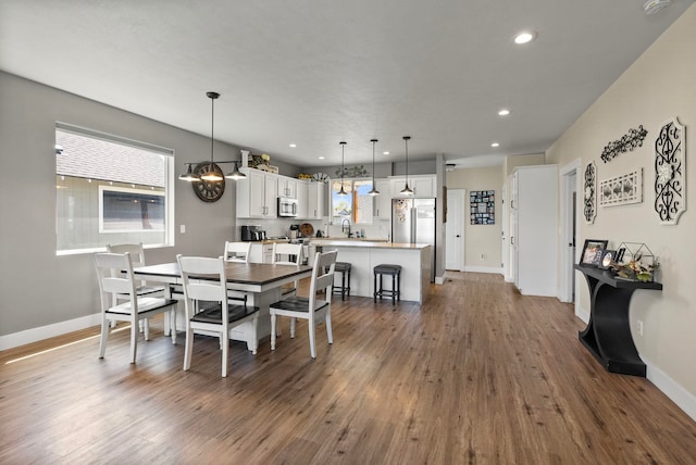 1812 E Columbia Ave, Spokane, WA 99208 - dining area with baseboards, dark wood-type flooring, and recessed lighting