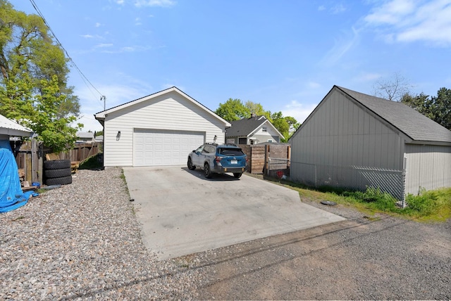 1812 E Columbia Ave, Spokane, WA 99208 - view of side of home with a detached garage