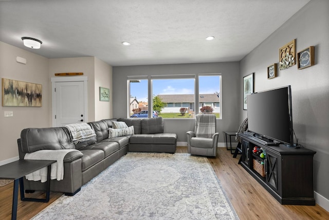 1812 E Columbia Ave, Spokane, WA 99208 - living room with light wood-style floors, recessed lighting, and baseboards