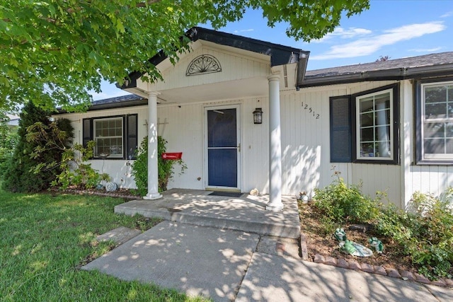 12512 W 10th Ave, Airway Heights, WA 99001 - doorway to property featuring a yard and covered porch
