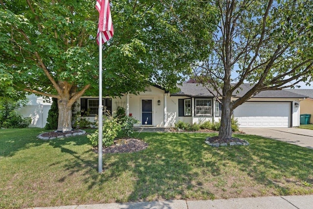 12512 W 10th Ave, Airway Heights, WA 99001 - view of front of home featuring a garage, concrete driveway, and a front lawn