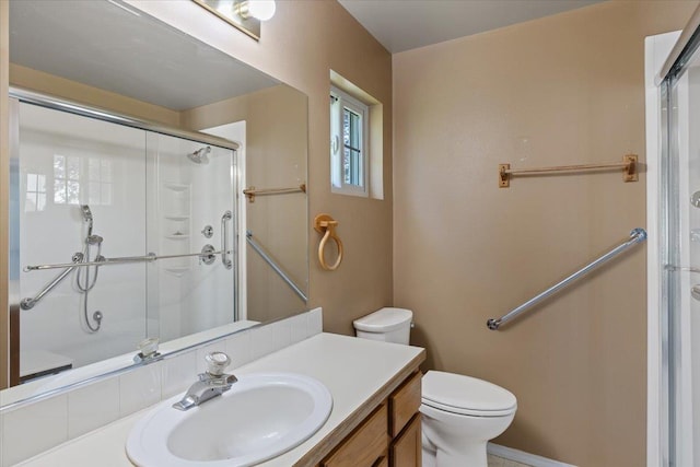 12512 W 10th Ave, Airway Heights, WA 99001 - bathroom with an enclosed shower, vanity, and toilet