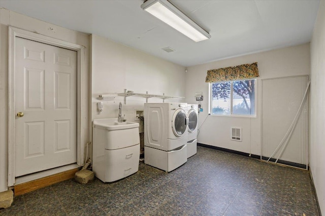 12512 W 10th Ave, Airway Heights, WA 99001 - washroom featuring separate washer and dryer and dark flooring