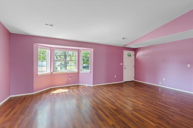 12512 W 10th Ave, Airway Heights, WA 99001 - empty room featuring wood finished floors, baseboards, and vaulted ceiling