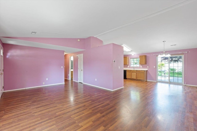 12512 W 10th Ave, Airway Heights, WA 99001 - unfurnished living room featuring a chandelier, baseboards, dark wood finished floors, vaulted ceiling, and a sink