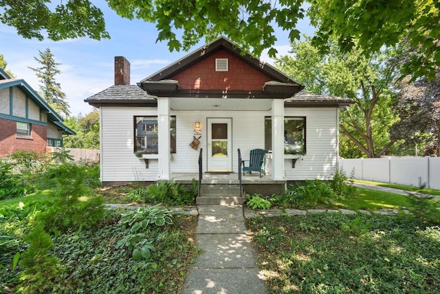 967 E 13th Ave, Spokane, WA 99202 - bungalow-style house featuring covered porch and a chimney