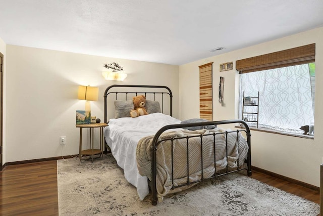 967 E 13th Ave, Spokane, WA 99202 - bedroom with baseboards and wood finished floors