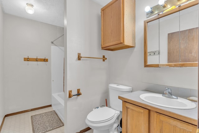3228 E 29th Ave, Spokane, WA 99223 - bathroom with toilet, vanity, shower / bathtub combination, and tile patterned floors