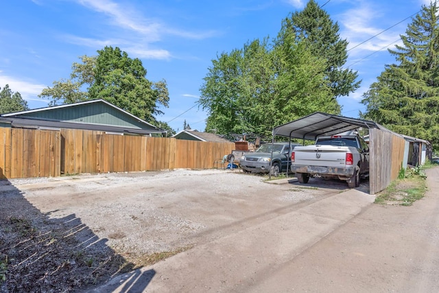 3228 E 29th Ave, Spokane, WA 99223 - view of parking featuring a detached carport