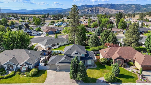 6314 W Skagit Ave, Spokane, WA 99208 - aerial perspective of suburban area with a mountainous background