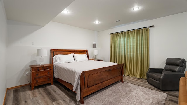 6314 W Skagit Ave, Spokane, WA 99208 - bedroom featuring wood finished floors, recessed lighting, and baseboards