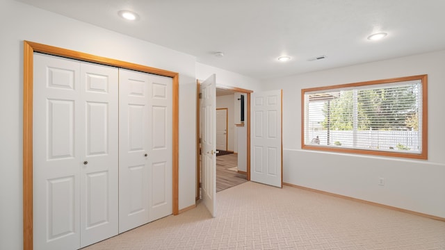 6314 W Skagit Ave, Spokane, WA 99208 - unfurnished bedroom featuring light colored carpet, baseboards, recessed lighting, and a closet