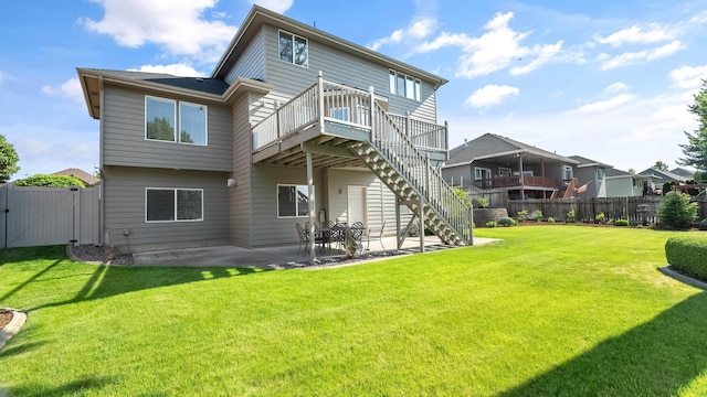 6314 W Skagit Ave, Spokane, WA 99208 - back of house featuring a gate, a patio, a wooden deck, and stairway