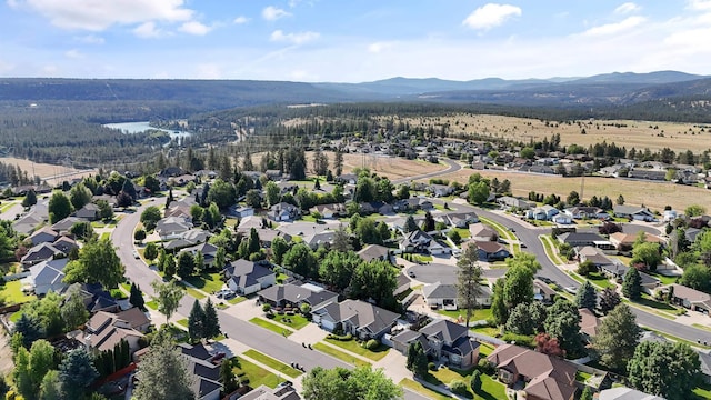 6314 W Skagit Ave, Spokane, WA 99208 - view of property location with a mountainous background, nearby suburban area, and a heavily wooded area