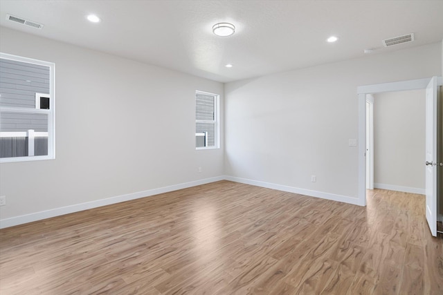 3405 E Yearling Rd, Chattaroy, WA 99003 - spare room with light wood-type flooring, baseboards, and recessed lighting