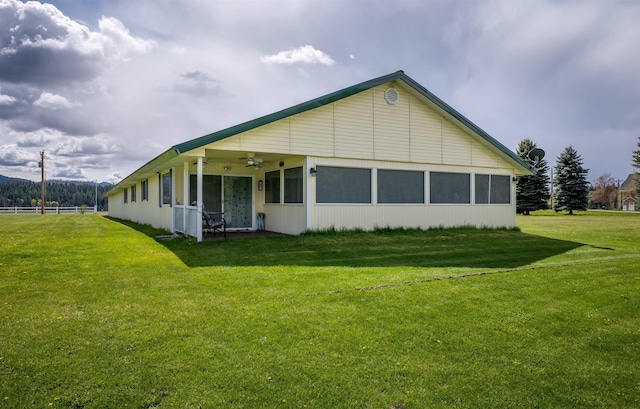 1651 Riverbend Loop Rd, Cusick, WA 99119 - view of home's exterior featuring a ceiling fan and a yard
