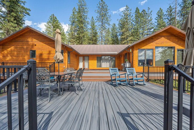 2378 Eagle River Way, Kettle Falls, WA 99141 - wooden deck featuring outdoor dining space