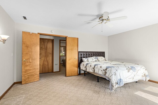 2378 Eagle River Way, Kettle Falls, WA 99141 - bedroom with carpet floors, baseboards, and a ceiling fan