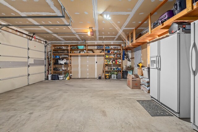 2378 Eagle River Way, Kettle Falls, WA 99141 - garage with white fridge with ice dispenser