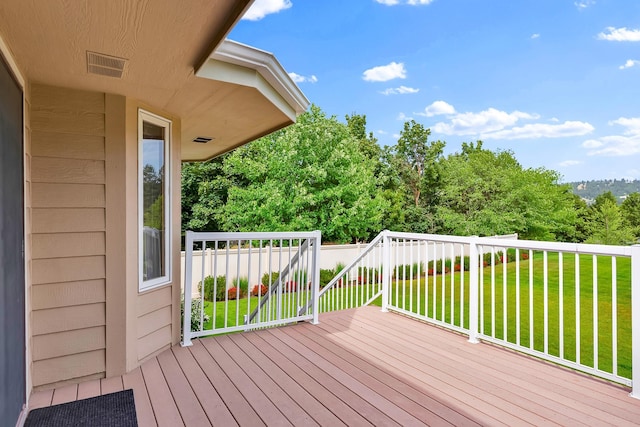 4605 E Birkdale Ln, Spokane, WA 99223 - wooden deck featuring a lawn