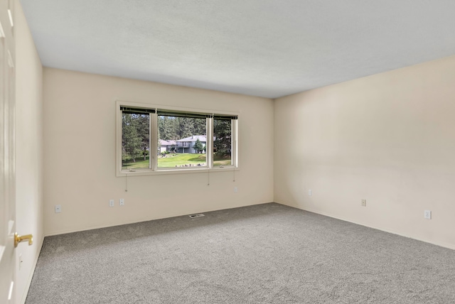 4605 E Birkdale Ln, Spokane, WA 99223 - carpeted empty room featuring baseboards