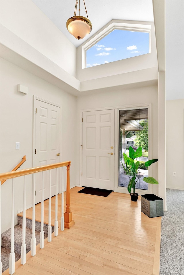 4605 E Birkdale Ln, Spokane, WA 99223 - entrance foyer with high vaulted ceiling, plenty of natural light, and wood finished floors