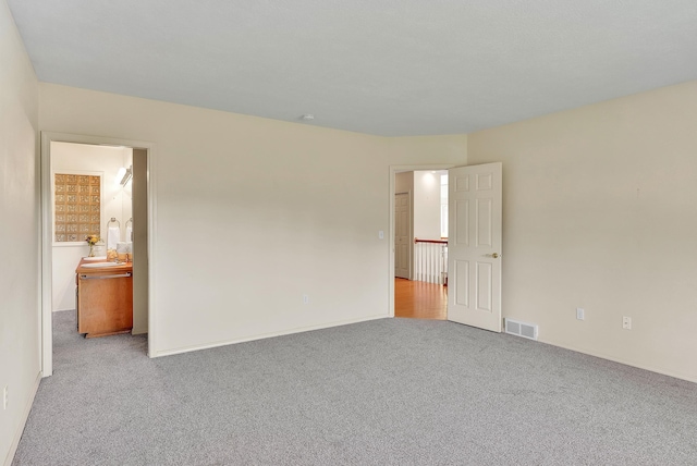 4605 E Birkdale Ln, Spokane, WA 99223 - carpeted spare room featuring baseboards