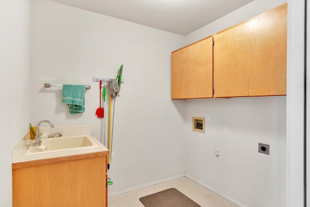 4605 E Birkdale Ln, Spokane, WA 99223 - washroom featuring cabinet space, electric dryer hookup, hookup for a washing machine, baseboards, and hookup for a gas dryer