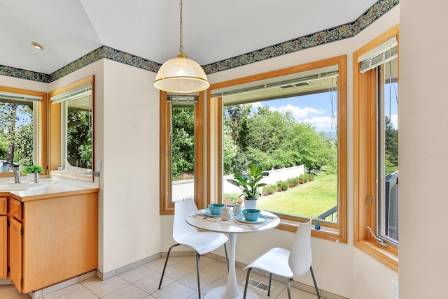 4605 E Birkdale Ln, Spokane, WA 99223 - dining room featuring healthy amount of natural light, light tile patterned flooring, and baseboards